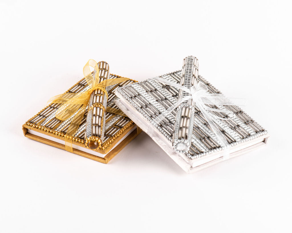 Libretita Metalica Con Pluma Dorada Plateada